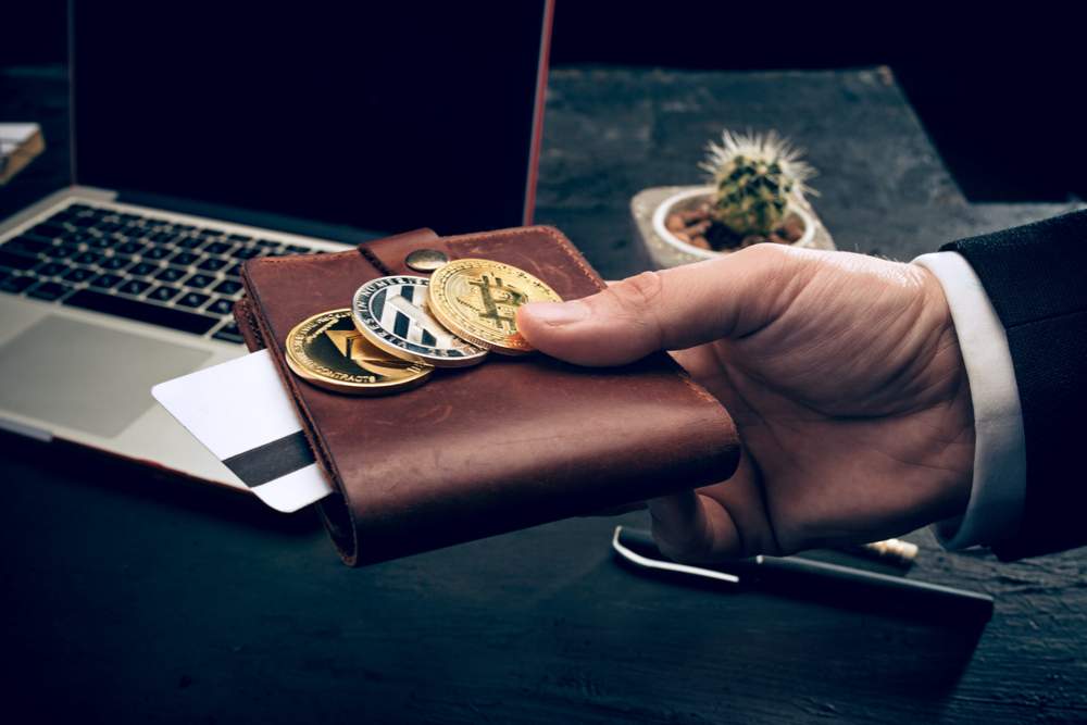 golden bitcoin mail hands